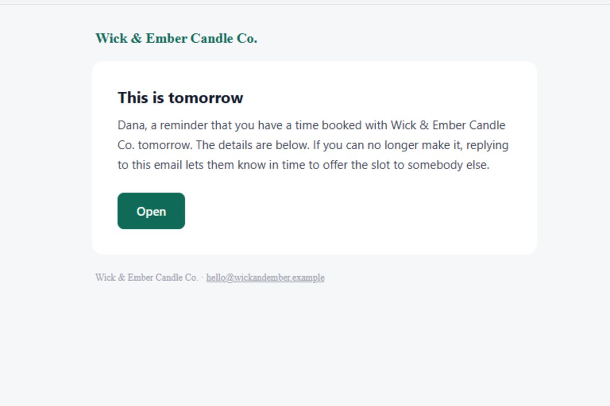 The booking reminder email, in the business's own name and colour